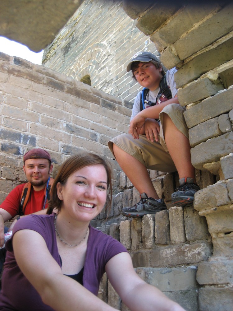 Jessica, Mark and Johnny taking a break in the shade of a watchtower along the Great Wall